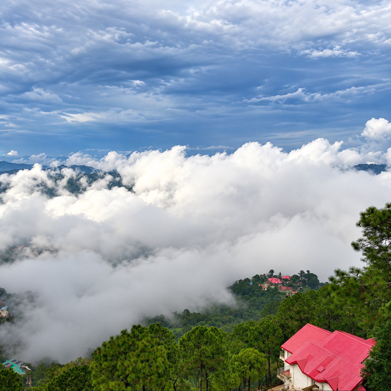 Clouds filling the valley below the house